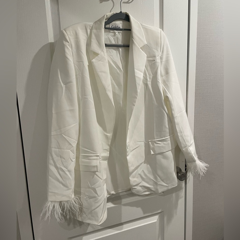 White blazer with feathered cuffs